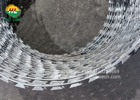 Concertina Spiral Razor Blade Wire Fence Razor Barbed Wire Alambre De Puas Baja tahan karat 900mm Diameter Koil